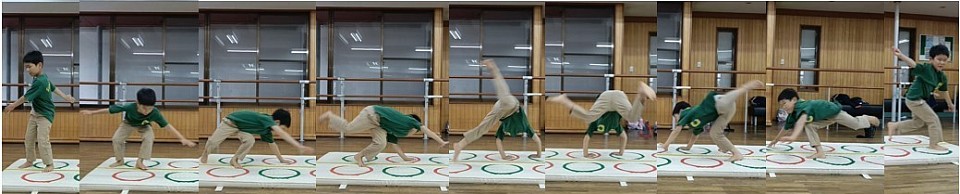 まずは側転小！教室に入って間もない１年生K君、写真から手ごたえが伝わってくるのは気のせい？いい感じなので続けましょう！